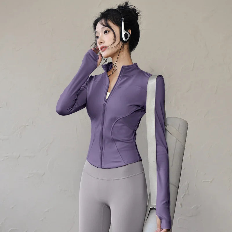Women's long sleeve sports jacket in purple, perfect for workouts and outdoor activities