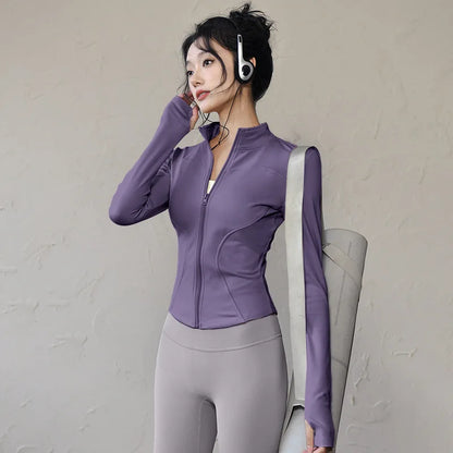 Women's long sleeve sports jacket in purple, perfect for workouts and outdoor activities