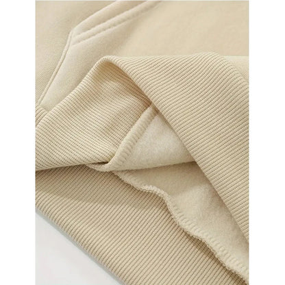 Close-up of women's mushroom print hoodie with soft fabric and cozy ribbed cuffs