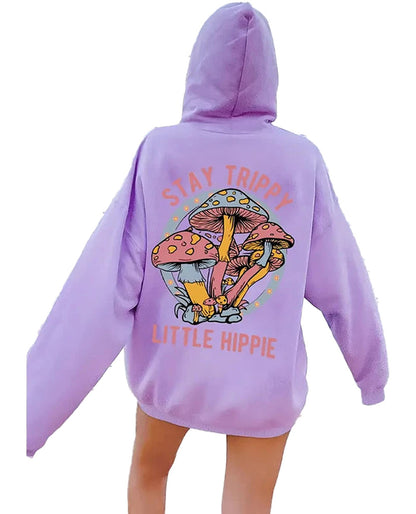 Women's mushroom print hoodie in lavender with colorful mushroom graphics and stay trippy quote