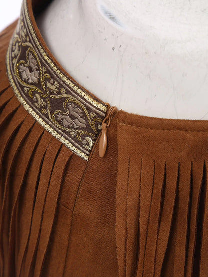 Close-up of women's Native American costume with decorative trim and fringe detailing