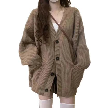 Cozy women's oversized knit cardigan in beige with buttons and a relaxed fit
