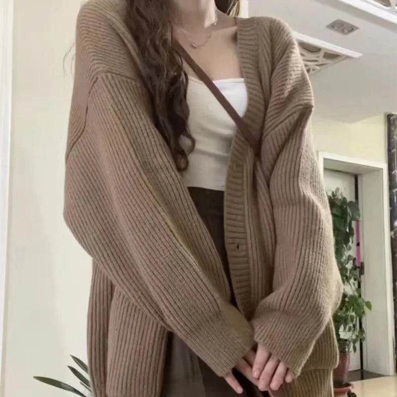 Casual women's oversized knit cardigan in earth tones, perfect for layering in cooler weather