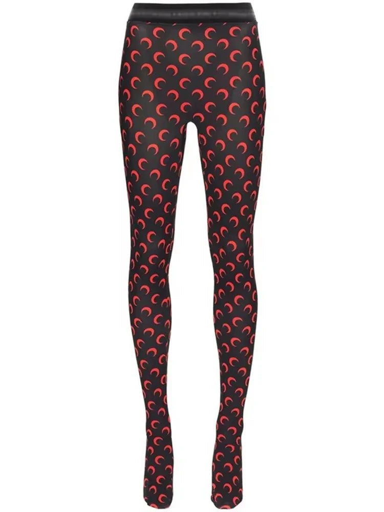 LuckeLadybug LLC women's printed elastic jumpsuit with vibrant red crescent moon pattern on a black background