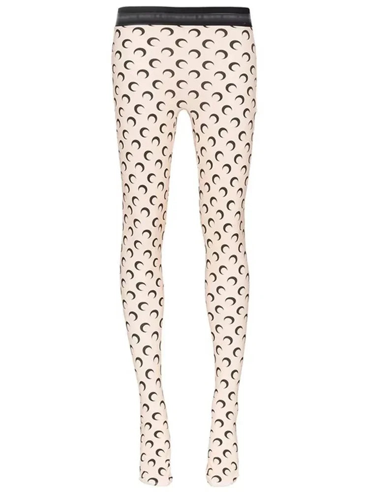 LuckeLadybug women's printed elastic jumpsuit in cream with black crescent moon pattern