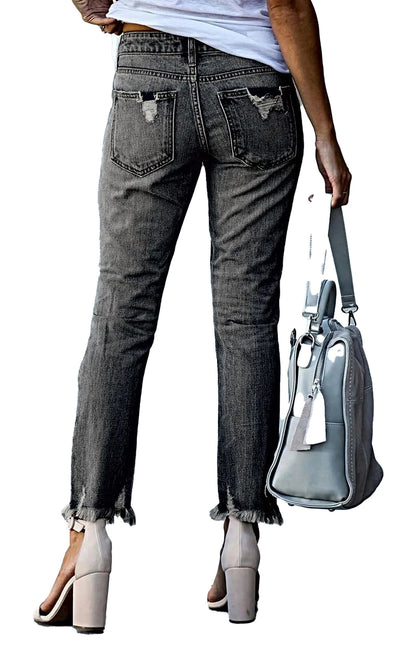 Back view of women's ripped straight leg jeans by LuckeLadybug with frayed hem and pockets