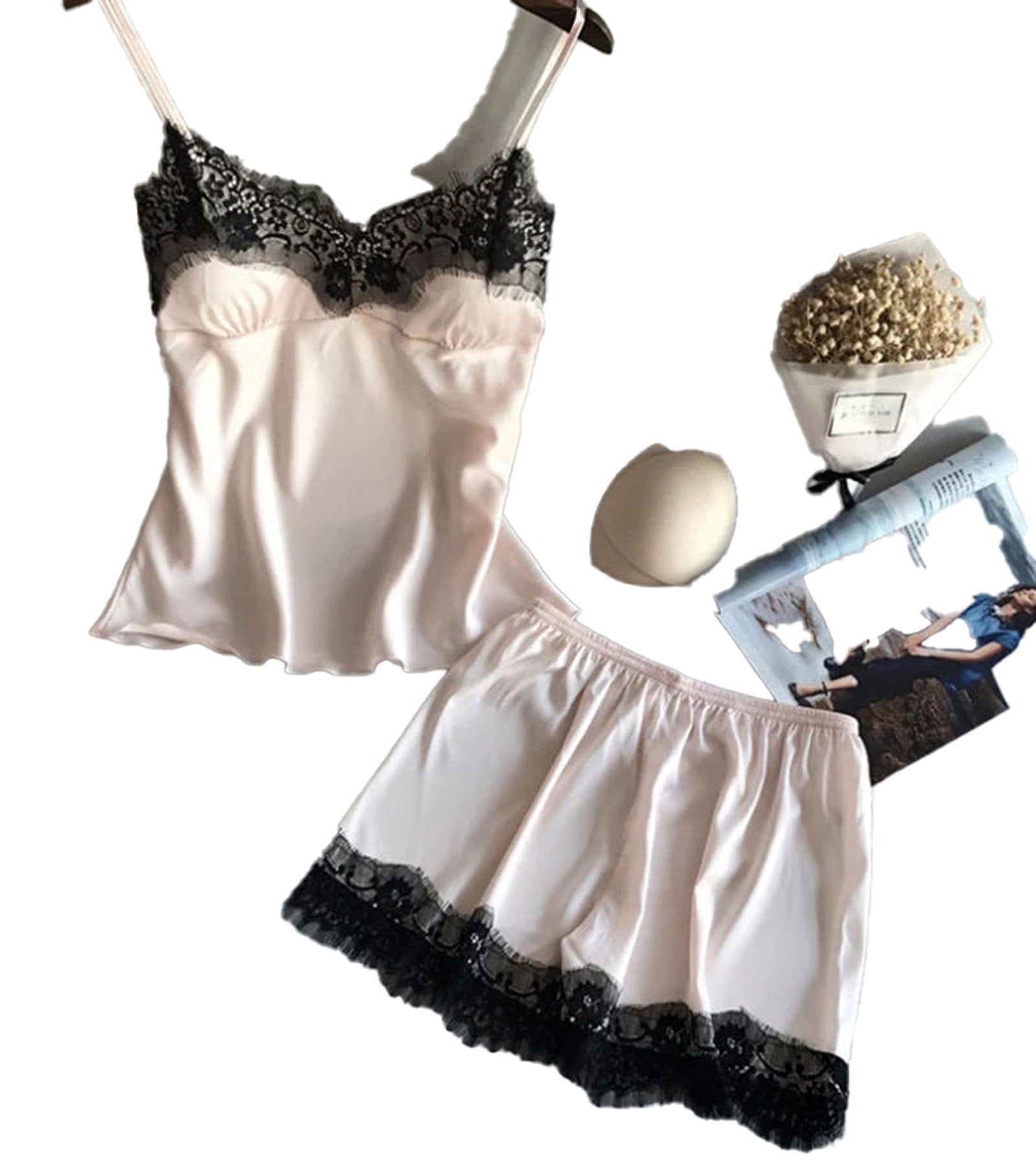 Women's satin pajama set in blush with lace trim for comfort and style by LuckeLadybug LLC