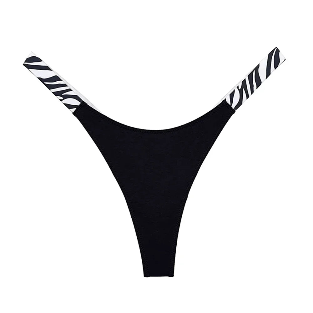 LuckeLadybug LLC women's sexy high cut thong in black with stylish zebra print straps