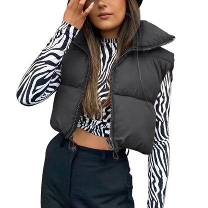 Stylish women's short down vest in black, perfect for layering with casual outfits.