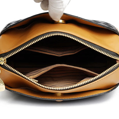 Inside view of a LuckeLadybug women's shoulder bag small satchel featuring organized compartments and a stylish design