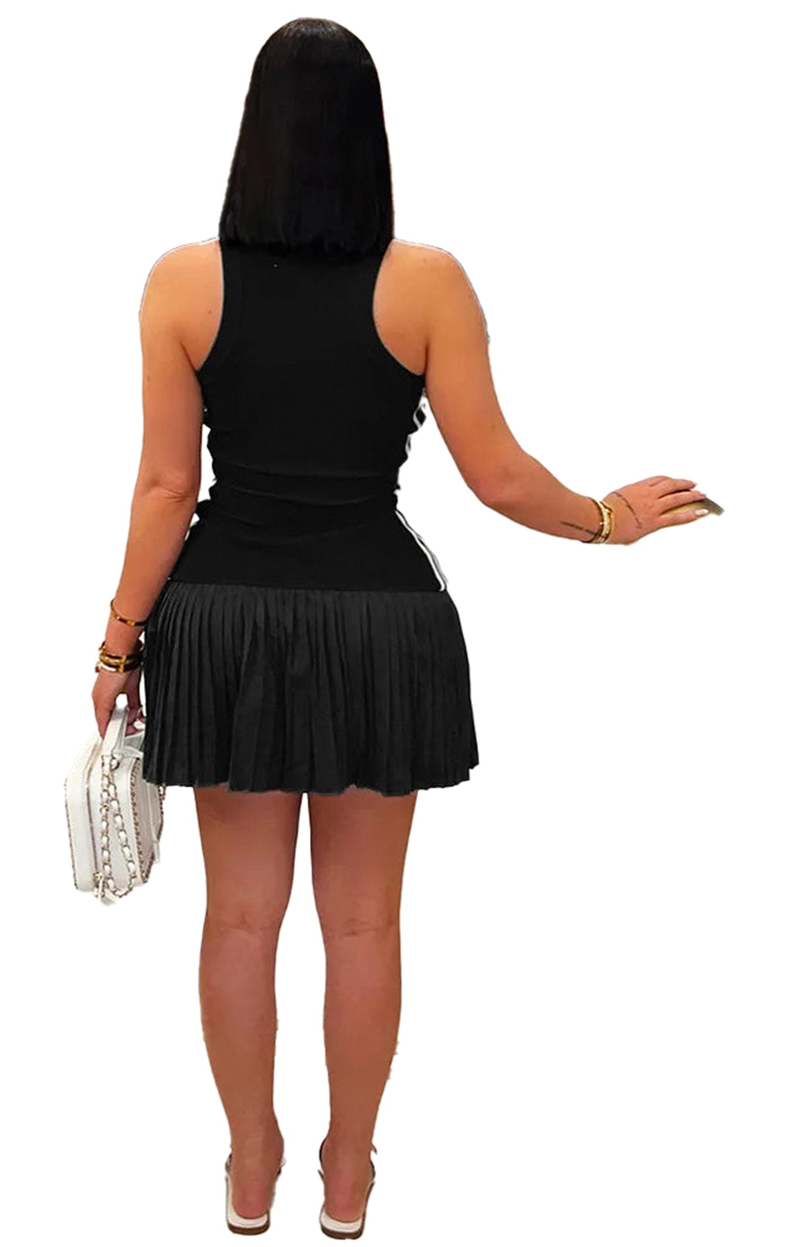 Women's sleeveless mini dress in black with pleated skirt detail and elegant back design