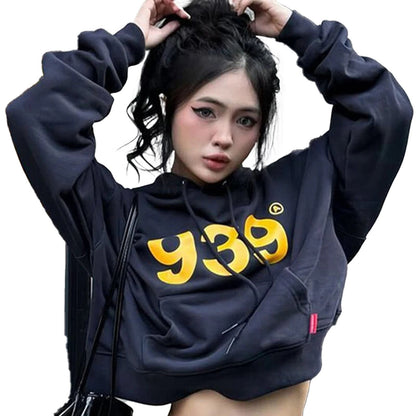 Women's streetwear hoodie in navy with bold yellow graphic logo and cropped design for casual style