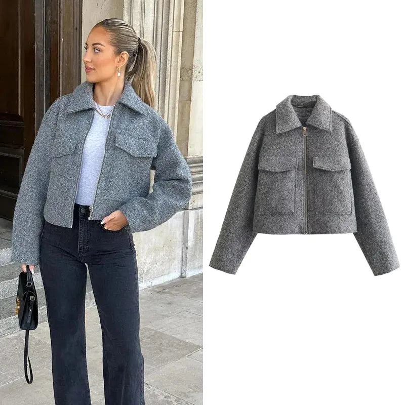 Model wearing a stylish women's tweed cropped jacket in gray with front pockets