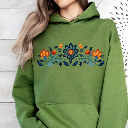 Women's washed hoodie with national symbols featuring floral and bird designs in vibrant colors