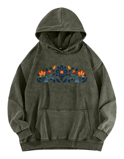 Women's washed hoodie with national symbols featuring floral design and a relaxed fit