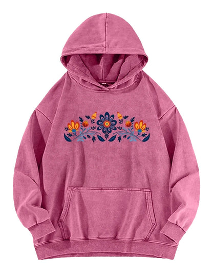 Women's washed hoodie with national symbols featuring floral embroidery in pink color