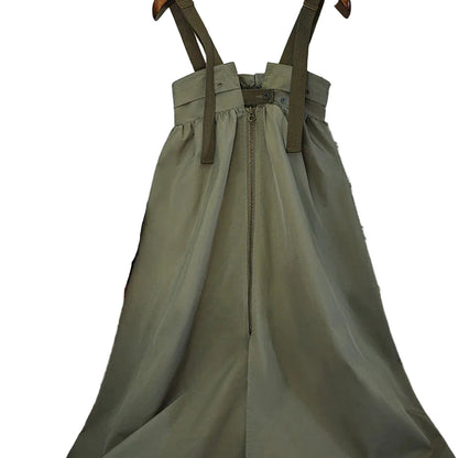 Women's workwear pinafore dress in olive green with adjustable straps and front zipper
