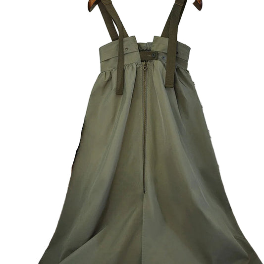 Women's workwear pinafore dress in olive green with adjustable straps and front zipper