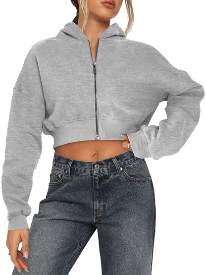 Women's zip hoodie oversized in grey featuring a cropped design and a relaxed fit for casual style