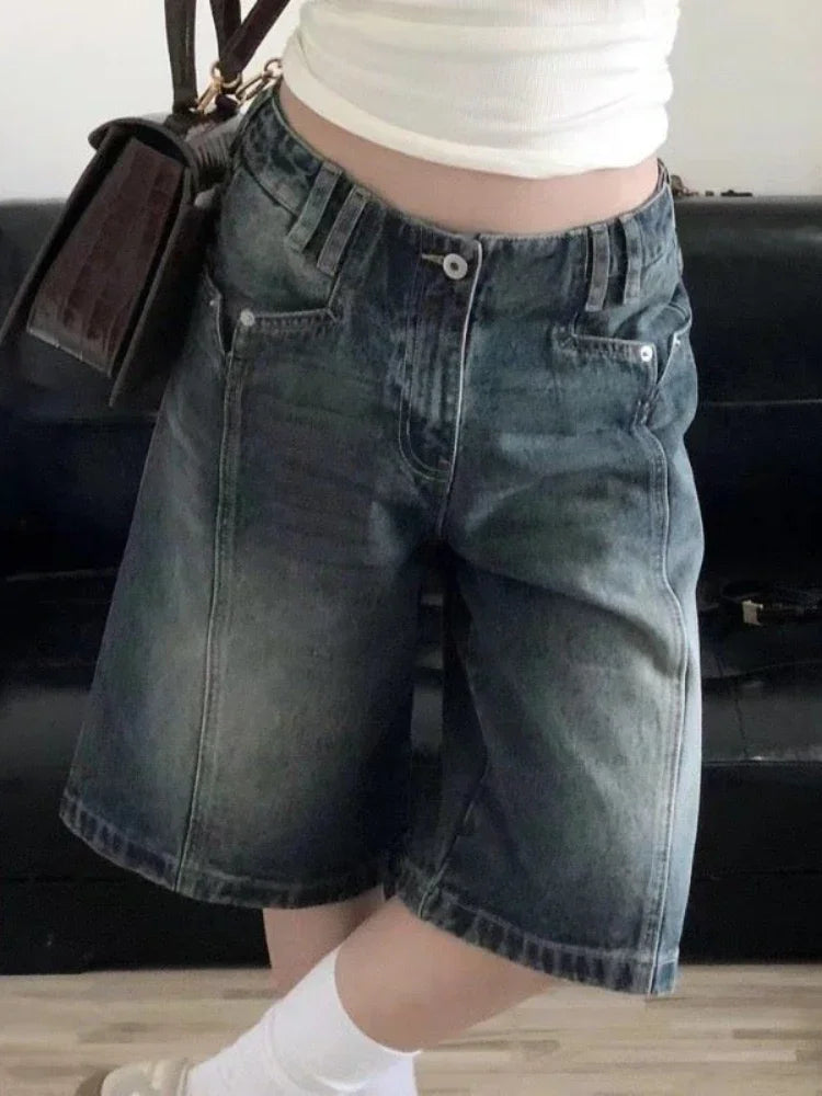 Y2K baggy denim shorts for women in faded blue with a relaxed fit and pockets