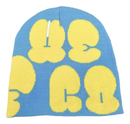Bright blue and yellow Y2K beanie for women and men with playful graphic design