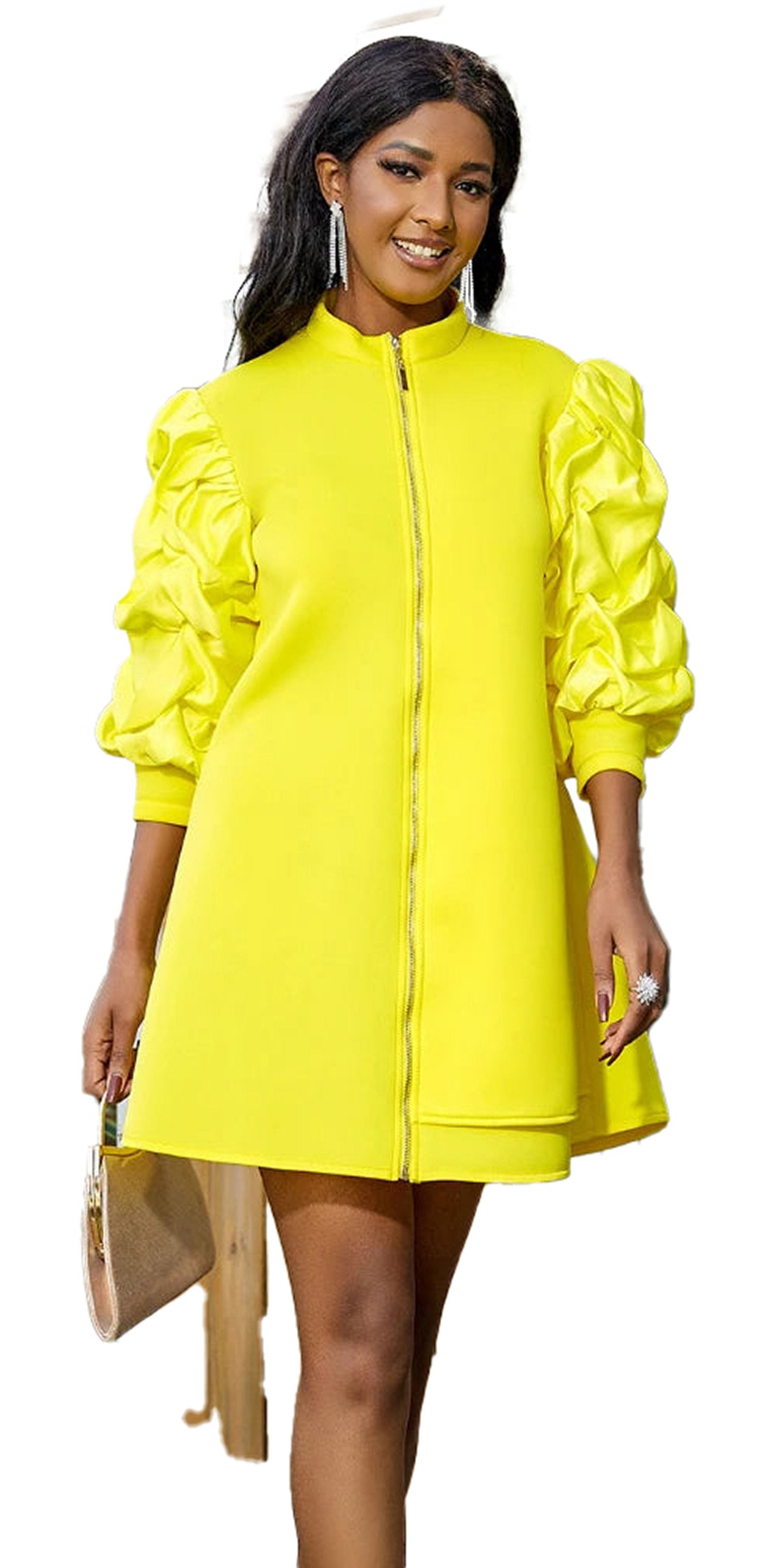 Woman wearing a vibrant yellow mini dress for women with puff sleeves and a zip front design