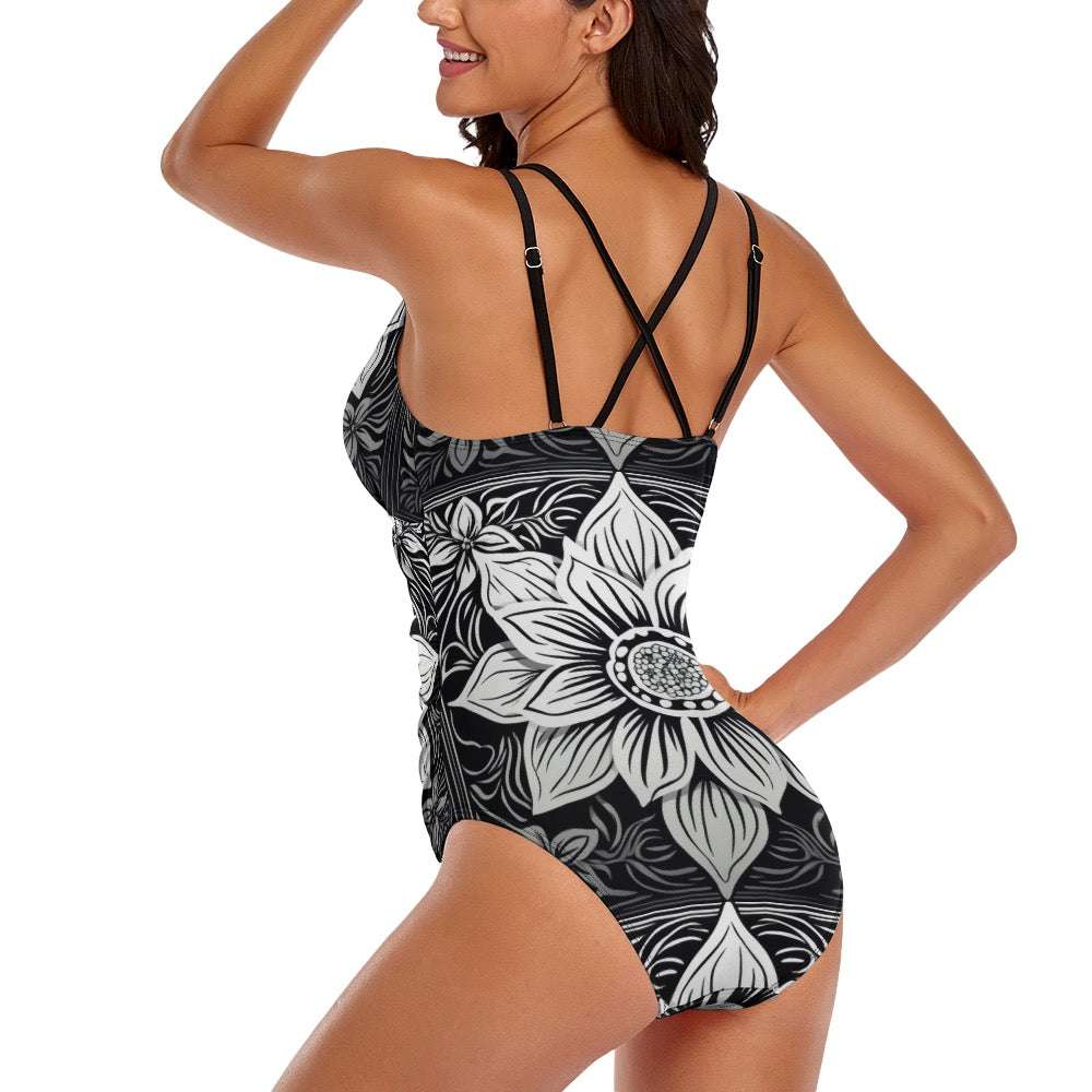 luckeladybug zebra flower one-piece swimsuit with black and white floral design and adjustable crisscross back straps
