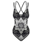 Luckeladybug zebra flower one-piece swimsuit with black and white floral and zebra stripe design