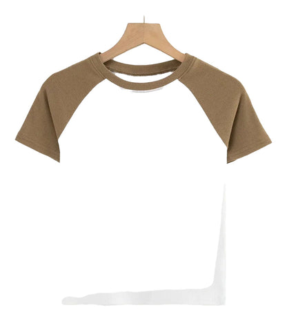 90s vintage crop top in white with brown raglan sleeves, perfect for retro style enthusiasts