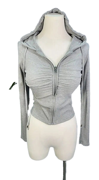 Stylish gray zip up hoodie for women with a fitted design and drawstring hood