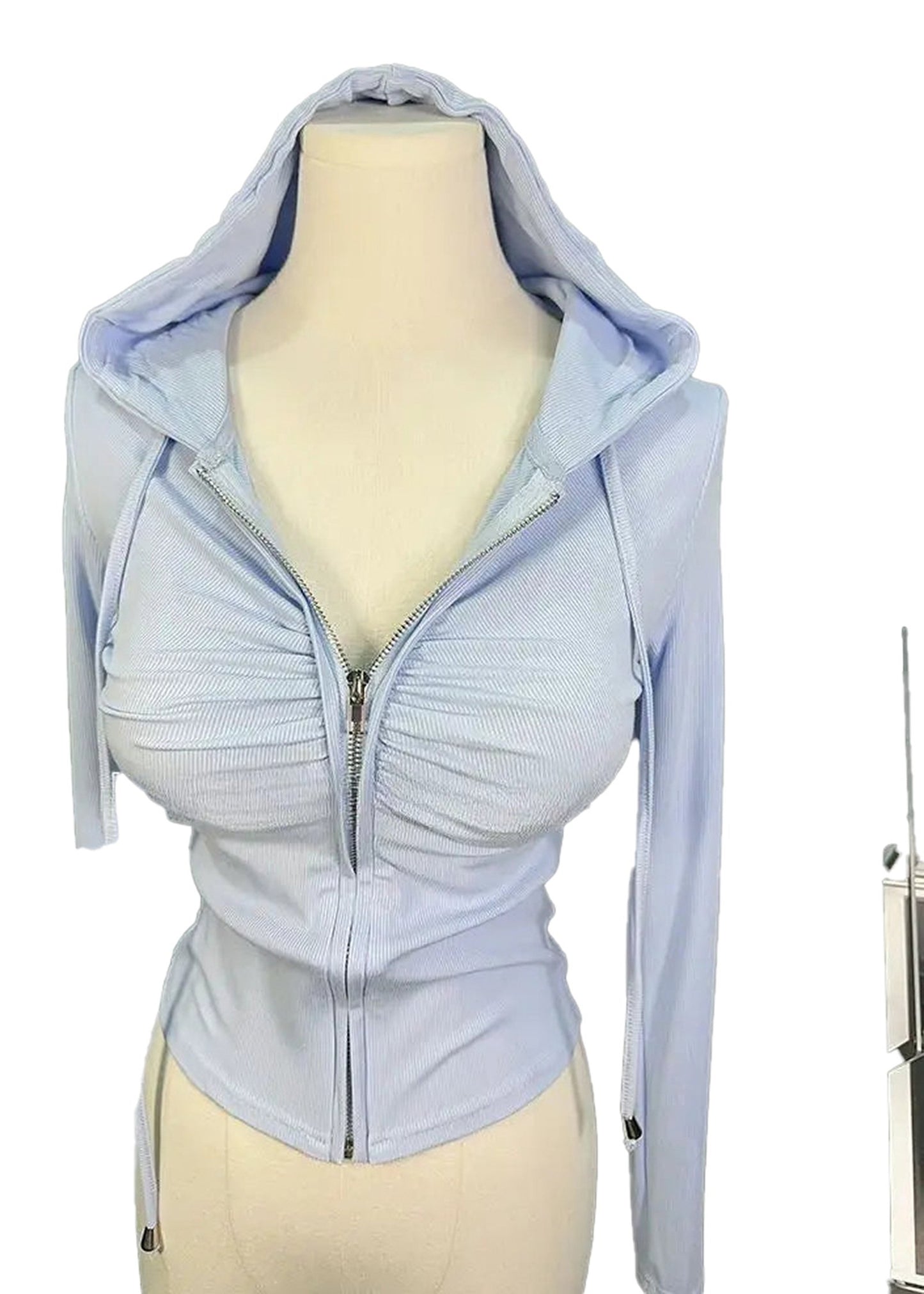 Light blue zip up hoodie for women with ruched detailing and a fitted design