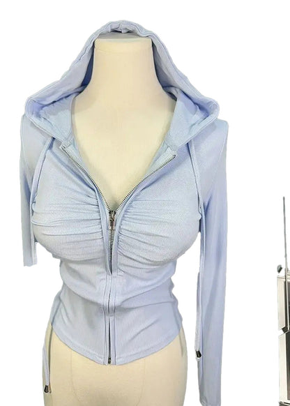 Light blue zip up hoodie for women with ruched detailing and a fitted design